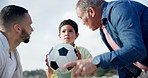 Teaching, soccer and family with child in game outdoor on summer, holiday or learning on vacation. Dad, grandfather and advice for kid with ball or talk together, bonding about football and sport