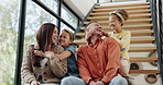 Man, woman and face of kids with smile for adoption, childhood development and holiday in home. Family, parents and children with happiness for love, bonding and relax together on staircase