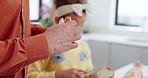 Father, daughter and eating a sandwich in kitchen with happiness, talking and hungry with support. Family, man and child with breakfast preparation in home with butter, smile or conversation at table