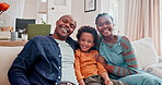 Happy, portrait and black family on sofa in home to relax on vacation of holiday together in South Africa. Parents, hug and smile with child on couch in lounge on weekend for bonding and break