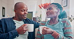 Couple, talking and laughing on sofa with coffee for relax, bonding and funny conversation in living room of home. Black people, drinking tea and happy with discussion, joke and healthy relationship