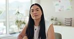 Serious, face and mature Asian woman in office with confidence for research on creative project. Career, professional and portrait of senior female designer working by desk in modern workplace.