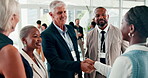 Business people, handshake and meeting in conference, introduction and discussion at global convention. Professionals, collaboration and agreement or greeting at seminar, welcome and b2b thank you