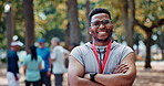Man, face and exercise runner in  in park for group cardio or workout, nature or outdoor. Black person, smile and confidence as personal trainer for forest wellness or challenge, morning or athlete