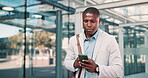 Businessman, walking or phone in city commute to work or office on outdoor travel with message. Sidewalk, employee and black man networking in urban area, Cape Town or business with news and trip