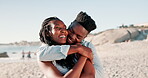 Couple, embrace and happy on beach with love for romance, affection or bonding on honeymoon vacation. Black man, woman and hug by ocean for anniversary date, relax or commitment with joke in Maldives