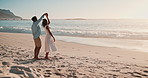 Couple, dancing and together at beach for vacation with bonding, love and care with holding hands. People, African man and black woman with dancer, partner and moving on holiday for connection by sea