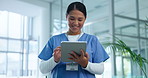 Hospital, doctor and Asian woman on tablet for online research, medical service and consulting. Healthcare, clinic and health worker on digital technology for insurance, communication and telehealth