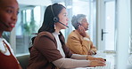 Asian woman, call center and consulting with headphones in agency for customer service or support at office. Female person, consultant or team of agents talking for online advice or help at workplace