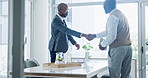 Meeting, handshake and interview with business man in office for hiring, recruitment or onboarding. Smile, welcome or greeting with employee people shaking hands in workplace for corporate discussion