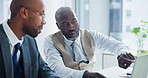 Business people, teamwork and planning on laptop for planning, advice and feedback of profit, sales or revenue. Financial advisor, accountant or african man talking to b2b client with office computer