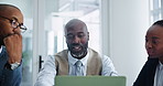 Business people, man and discussion in meeting with laptop for project feedback and strategy planning in office. Collaboration, employees and communication for company review and happy with teamwork