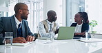 Business people, man and discussion in meeting with laptop, project feedback and creative planning with documents. Collaboration, employees or paperwork with communication, company review or strategy