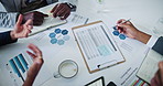 Closeup, hands and business people with documents, charts and statistics with information and brainstorming. Staff, group and employees with paperwork and graphs for investment and project feedback