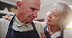 Senior, couple and hug in kitchen with love, support and helping in marriage and retirement. Elderly, man and woman with kindness and gratitude for cooking dinner in home together with happiness