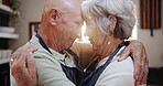 Senior, couple and hug in kitchen with love, support and care in marriage and retirement. Elderly, man and woman embrace with kindness or gratitude for cooking in home together with happiness