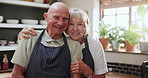 Happy, face and old couple in kitchen hug with love, support and care in marriage or retirement. Elderly, man and woman embrace with kindness and gratitude for cooking dinner in home together