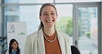 Smile, happy and businesswoman in office, workspace and boardroom with coworkers for business career. Female person, leader and banker professional for corporate job, work and pride in staff