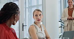 Discussion, laptop and business women in office in meeting for planning, brainstorming or ideas. Conversation, documents and professional female designers in collaboration on project in workplace.