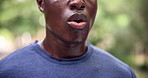 Breathing, fitness and mouth of tired man in park closeup for running, recovery or morning exercise break in nature. Sports, sweat or runner with workout fatigue in forest for training, stop or break