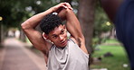 Nature, sports and man stretching arms for exercise in outdoor park, field or garden. Fitness, health and African male athlete with muscle warm up workout for training with personal trainer.