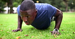 Fitness, push up and black man in park for morning workout in garden with grass, action and sweat. Health, wellness and trees with athlete in nature for warm up, exercise and body training challenge.