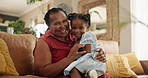 Grandmother, child and hug or face in home, affection and bonding or care in living room. Black family, portrait and grandma on couch and laughing on weekend, conversation and embrace in lounge