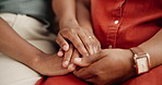 Closeup, holding hands and home with people, empathy and grief with support and sympathy. Apartment, hope and help with loss, love and comforting with trust and anxiety with wellness and compassion