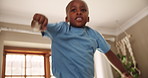 Jump, fun and kid in a house happy, playing and wake up with morning energy, games or bounce at home. Joy, moving and African boy with freedom, celebration or excited for vacation, holiday or weekend