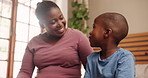 Conversation, talking and mother with child in bedroom for bonding, loving relationship and happy together, Black family, love and African mom with young boy for speaking, chatting and relax in home