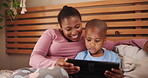 Bedroom, relax and mother with son, tablet and typing with live streaming and connection. Home, black family and mama with boy and kid with tech or social media with child development and digital app