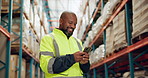 Happy, black man and logistics with phone for communication, social media or networking at warehouse. African male person or employee with smile on mobile smartphone for online chatting or texting