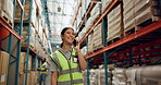 Happy woman, phone call and logistics with storage for conversation, communication or discussion at warehouse. Young female person or employee talking on mobile smartphone for supply chain at depot