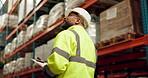 Manufacturing, warehouse and black man with clipboard for inspection, inventory and check stock. Shipping, distribution and person writing notes for logistics, maintenance and checklist in factory