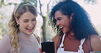 Education, phone and student friends laughing on university campus together in summer. School, college and meme with funny young women outdoor at academy for social media or learning scholarship