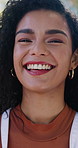 Student, happy and face of young woman laughing in outdoor park at university for studying. Smile, education and portrait of confident young female person from Colombia in field at college campus.