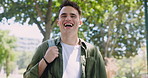 Student, nature and face of man laughing in outdoor park at university for studying scholarship. Happy, education and portrait of confident young male person from Canada in field at college campus.