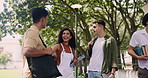 Education, hugging and student friends laughing on university campus together in summer. School, college and greeting with funny group of young people outdoor at academy for learning scholarship