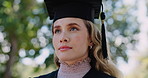 University, woman and relax at student graduation for ceremony in outdoor park campus event. Breathe, achievement and proud girl at college celebration for education, opportunity and future dream job