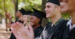 University, students and applause at graduation at ceremony in park at outdoor campus event. Friends, achievement or happy people at college celebration for education, opportunity and congratulations