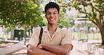 Smile, crossed arms and face of man student in outdoor park at university for studying scholarship. Happy, education and portrait of confident young male person from Mexico in field at college campus