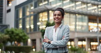 Smile, crossed arms and business woman in city with positive, good and confident attitude for career. Happy, pride and portrait of professional female person from Colombia standing in urban town.