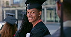 Smile, graduation and face of man with students at university in line with diploma, degree or scroll. Happy, education and portrait of young male person waiting with college certificate at school.