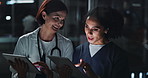 Doctors, women and report in night with tablet, click or planning for medical discussion in hospital. Nurse, medic and people with application, results or review for feedback, analysis and healthcare