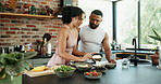 Happy, health and couple with fruit salad in kitchen for healthy, nutrition or diet breakfast. Smile, love and young man and woman preparing smoothie bowls together for wellness snack in apartment.