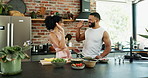 High five, cooking and couple with salad in kitchen for healthy, wellness and diet lunch at home. Happy, love and young man and woman preparing meal, supper or dinner with vegetables apartment.