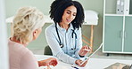 Woman, doctor and talking to patient with tablet for healthcare advice, prescription or diagnosis at clinic. Female person, cardiologist or medical worker consulting client on technology for results