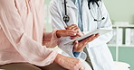 Tablet, hands and doctor with female patient for consultation in hospital with research. Digital technology, discussion and closeup of healthcare worker explain medical diagnosis to woman in clinic.