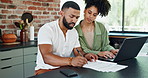 Couple, paper and laptop by desk with brainstorming for loan application, budgeting or planning expenses together. Man, woman and technology in home with bills, invoice or financial documents