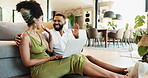 Couple, high five and laptop in home for achievement celebration with partnership support, goal or good news. Man, woman and online connection in living room for winner deal, victory or relationship